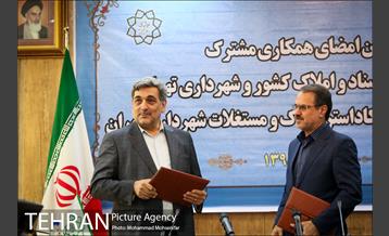 امضا تفاهم نامه میان شهرداری تهران و سازمان ثبت اسناد 27