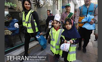 پاکسازی خیابان ولیعصر به مناسبت روز جهانی داوطلب 6