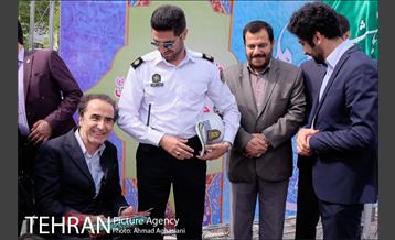 آیین رونمایی از تابلوی میدان قمر بنی هاشم (ع) 12